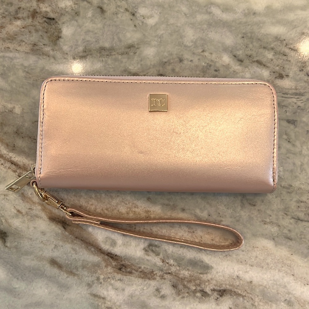 Rachel Cruz leather wallet, Rose gold cash stuffing wallet in good condition.